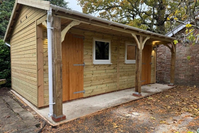 This is an example of a medium sized traditional detached office/studio/workshop in Hampshire.