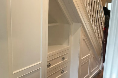 Storage with dresser style under stairs