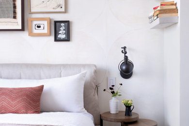 Inspiration for a small modern wallpaper bedroom remodel in New York