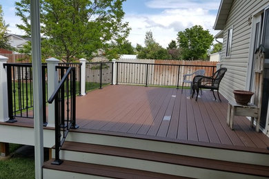 Deck - mid-sized traditional backyard deck idea in Boise with no cover