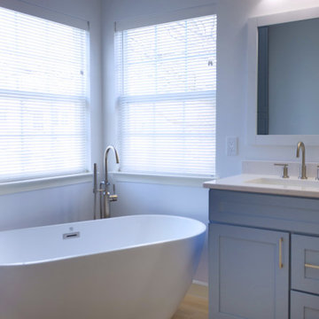 Spacious Bathroom with Dual Vanity and Freestanding Tub