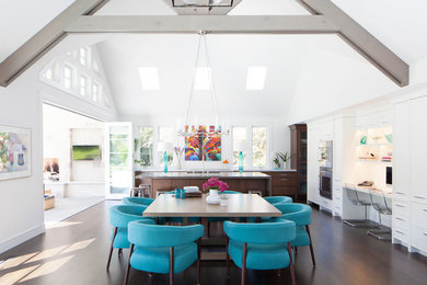 Example of a large transitional dark wood floor kitchen/dining room combo design in San Francisco with white walls and no fireplace