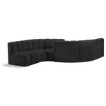 Meridian Furniture - Arc Vegan Leather Upholstered 6-Pc. Facing Modular Sectional, Black - Unleash modern opulence with the Arc Vegan Leather 6pc. Sectional. Crafted for the modern connoisseur, this Sectional injects an air of refined luxury into any space. Its sleek silhouette, upholstered in supple black vegan leather, exudes timeless sophistication while the deep channel tufting adds textural intrigue, further elevating the chair's visual appeal. The modular design makes it a versatile chameleon, effortlessly adapting to your evolving needs and preferences. Whether you envision it gracing a chic living room corner, basking in the glow of a bedroom window, or adding a touch of drama to a home office, the Arc seamlessly complements your unique interior aesthetic.