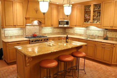 Inspiration for an eat-in kitchen remodel in New York with an undermount sink, granite countertops and stainless steel appliances