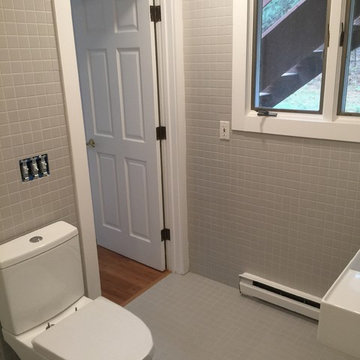 Custom tiled master bath with barrier free shower