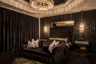 Bedroom - large transitional master porcelain tile and beige floor bedroom idea in Tampa with black walls, a corner fireplace and a stone fireplace