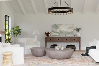 Mid-sized beach style open concept medium tone wood floor, brown floor and vaulted ceiling living room photo in Vancouver with white walls, a plaster fireplace and a wall-mounted tv