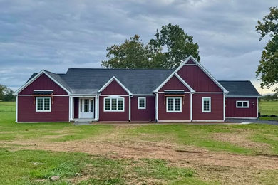 Example of a farmhouse exterior home design in DC Metro