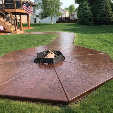 After photo ofoncrete fire pit seating area and walkway restoration
