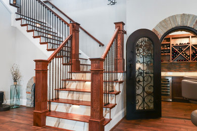 Inspiration for a transitional dark wood floor wine cellar remodel in Raleigh