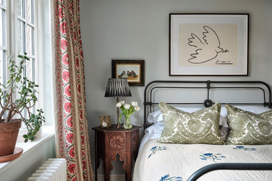 Photo of a traditional bedroom in London.