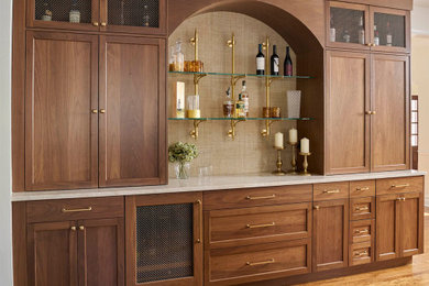 Inspiration for a large transitional single-wall dark wood floor and brown floor dry bar remodel in Philadelphia with shaker cabinets, dark wood cabinets, quartz countertops, beige backsplash and beige countertops
