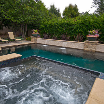 Raised Stone Spa w/ Infinity Edge