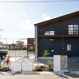 他の地域のトロピカルスタイルのおしゃれな家の外観の写真