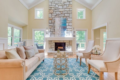 Living room - large eclectic formal and open concept light wood floor living room idea in Louisville with a stone fireplace