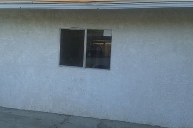 Removal of this wall & Install of Garage Door