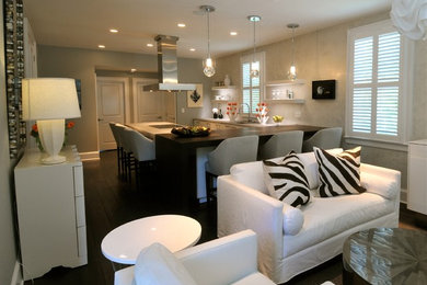 Living room - modern open concept dark wood floor living room idea in Charleston with gray walls and a wall-mounted tv