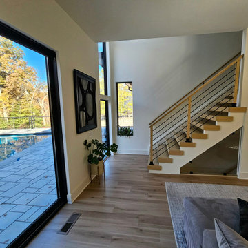 Project #111 | Open-Riser Staircase with Glass Panel Detail