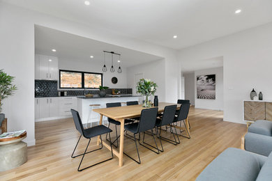 Design ideas for a scandinavian dining room in Hobart.