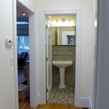 Powder room fills unused hallway space