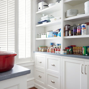 Farmhouse kitchen pantry designs - Kitchen pantry - cottage medium tone wood floor kitchen pantry idea in Richmond with white cabinets, granite countertops, white backsplash and stainless steel appliances