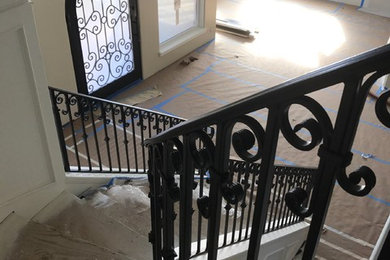 Design ideas for a contemporary staircase in Sacramento with metal railing.
