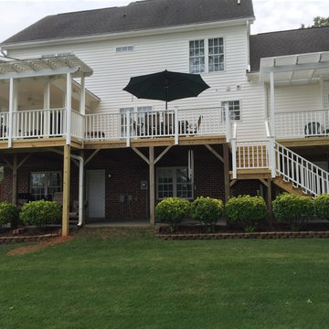 Clemmons, NC Eze Breeze Window Room with Double White Aluminum Pergolas.