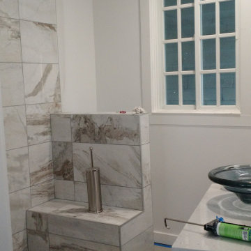 Master Bathroom Remodel with Marble Tile, Pebble Floor & Barn Door — Alameda, CA