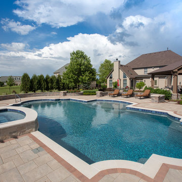 Elgin, IL Roman End Pool with Freeform Hot Tub