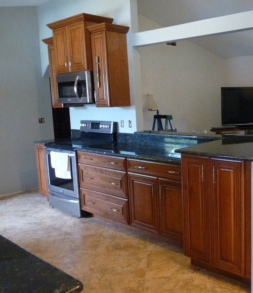 What Wall Color Goes With Medium Cherry Cabinets And Toffee Leather What Wall Color Goes With Medium Cherry Cabinets And Toffee Leather Furniture Mixed Golden Colored Tile