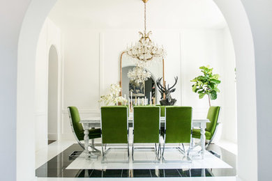 Transitional marble floor and black floor enclosed dining room photo in Miami