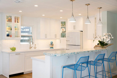 Example of a beach style kitchen design