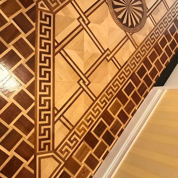 Decorative border frames the flooring much like a picture frame