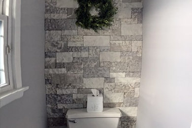 Country bathroom photo in Philadelphia with gray walls and marble countertops