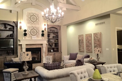 Large elegant open concept dark wood floor and brown floor family room photo in Cincinnati with beige walls, a standard fireplace, a media wall and a stone fireplace