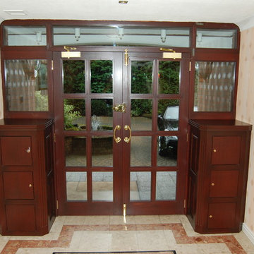 Mahogany front door with glazed panels, brass fittings and 6 post boxes