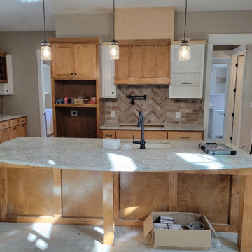 Custom Wood Kitchen Island & Range Hood Surround with Two-Tone Cabinetry