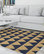 LASH NAVY AND GOLD Area Rug By Becky Bailey