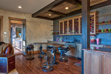 Example of a classic home bar design in Other