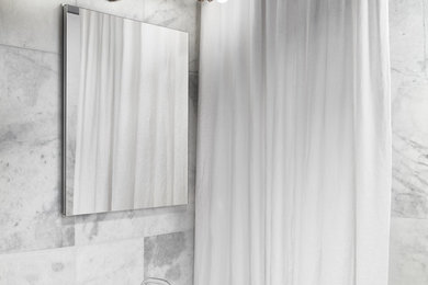 Example of a mid-sized minimalist white tile and marble tile marble floor and white floor shower curtain design in Boston with white walls and a pedestal sink