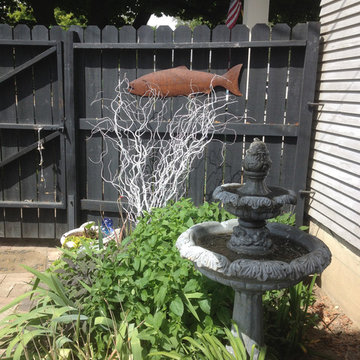 Fountain vignette with black fence