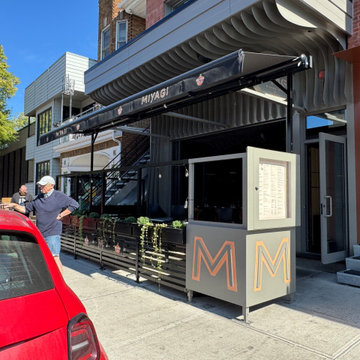 Here is a beautiful Betterliving™ retractable awning installed for a cute bistro