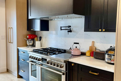 Example of an arts and crafts kitchen design in Vancouver