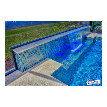(Rennehan) FT MYERS FL Superior Pools Swimming Pool With Raised Wall & Waterfall