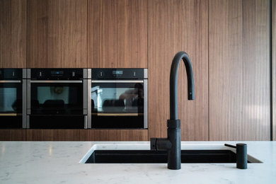 This is an example of a modern kitchen in Other.