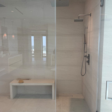 Oceanfront Limestone Spa Bathroom with Slab Walls - Malibu