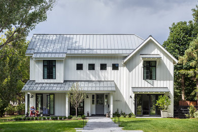 Example of a cottage exterior home design in Denver