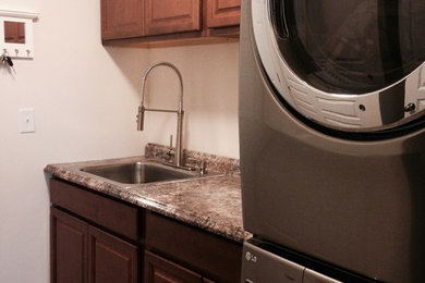 Example of a trendy laundry room design in Cincinnati