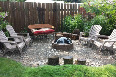 Inspiration for a small coastal drought-tolerant and partial sun backyard gravel landscaping in Toronto for fall.
