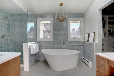 Bathroom - large eclectic blue tile and terra-cotta tile porcelain tile, gray floor, double-sink and wallpaper bathroom idea in Denver with shaker cabinets, medium tone wood cabinets, a bidet, blue walls, an undermount sink, quartz countertops, a hinged shower door, white countertops and a floating vanity